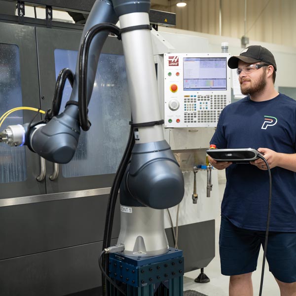 employee operating robot